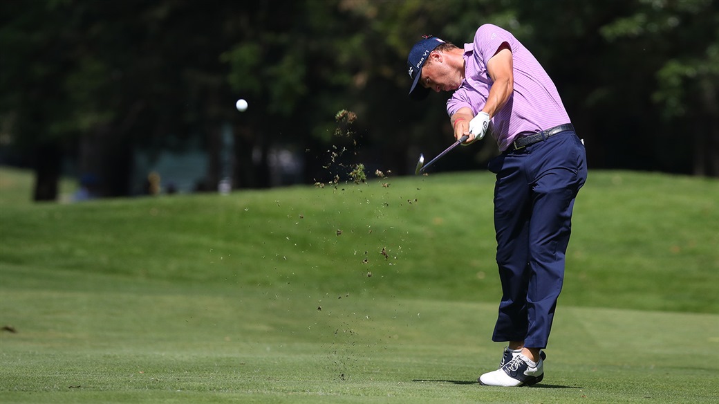  Golfer Swinging on fairway