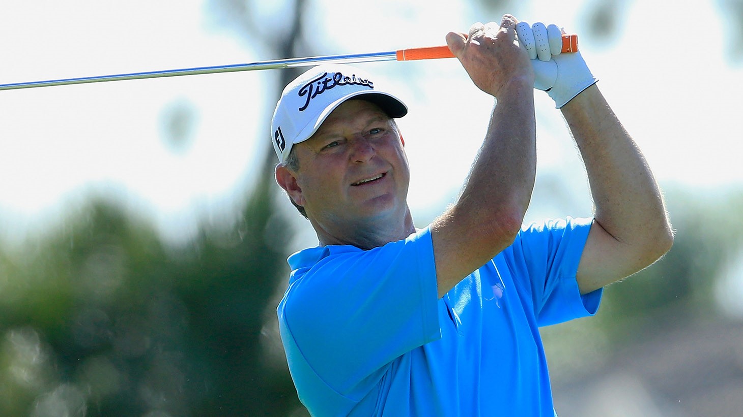 Wes Short, Jr. watches his Titleist Pro V1 golf ball fly towards the green during action at the 2019 Shaw Charity Classic